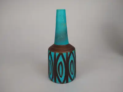 This lovely turquoise vase marked Ceramano Handarbeit, #34 "Turkis". West-Germany, 1960s production....
