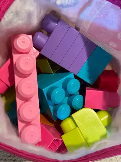 Large bag filled with Mega Bloks building toys. Also a collection of boys toys: cars, trucks… (girls...