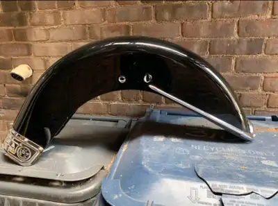 Front and rear fender with tombstone headlight and chrome trim. Both fenders will fit a 16” wheel, f...