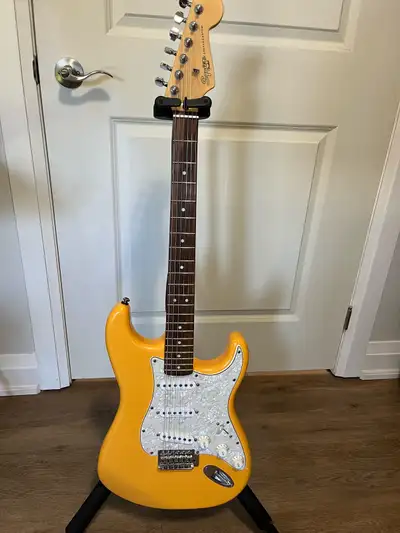 Squier Stratocaster/ Fender amp, View more