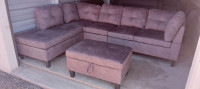 IN BOXES: BROWN REVERSIBLE SECTIONAL & OTTOMAN. FREE DELIVERY.