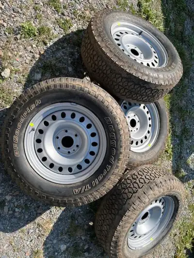 4 TIRES--P275/65R18 4 NEW STEEL RIMS, 6 ON 5 1/2 BOLT PATTERN $800 OR BEST OFFER LOCATED IN THE TIMM...