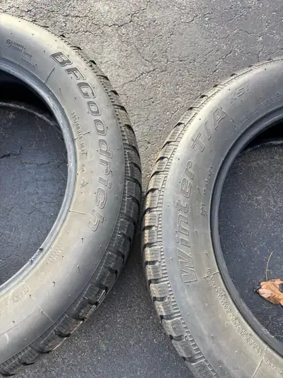 2 prices of Goodrich Winter T/A Tire 235/60R18. One for left and one for right. See photos for condi...