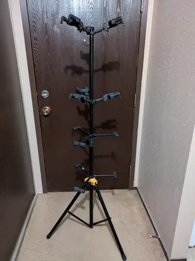 Holds up 6 guitars, don't have the room for it or that many guitars anymore. Someone else could prob...