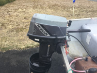 14’ boat motor and new trailer