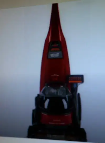 Bissell lift-off deep carpet cleaner with 2 new bottles of shampoo and 1 small open one I only used...