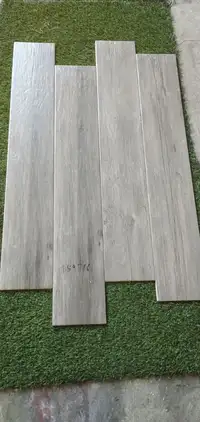 Brand New and Great Quality (6" x 36") Gray Wood Patterned Tiles