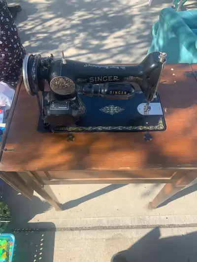 This wonderful genuine Singer antique sewing machine is an electric model. I have never plugged it i...