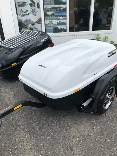 Cette remorque cargo Lugg&Roll est en excellente condition et offre une solution de transport compac...