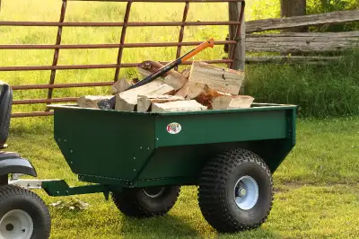 New Canadian made Atv/garden dump trailer. A great tool to help haul around your house or out in the...