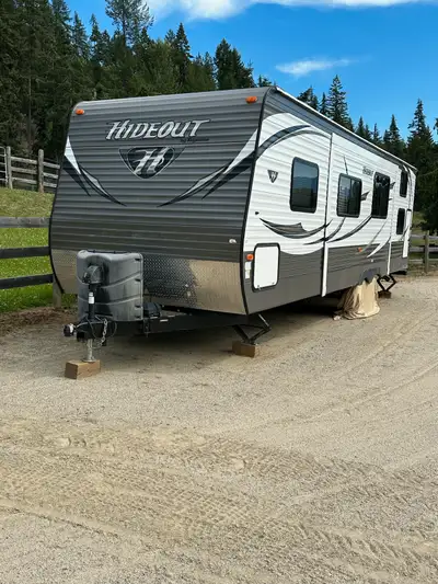 2016 Keystone Hideout 28BHS with cold mountain thermal package. Trailer is in beautiful condition, p...