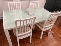 IKEA Dinning Table (glass top) and 4 chairs (light grey), white.