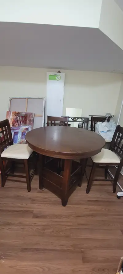 Dining table (round) and 4 matching chairs, View more