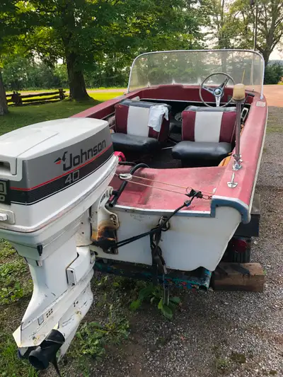 40hp Johnson out board, boat and trailer for sale. New marine battery, runs, idles reliable. 1800. O...