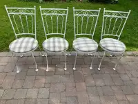 Four Patio Chairs 