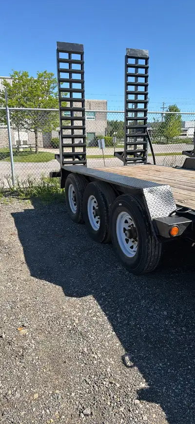 Selling a 2019 - 10 ton construction trailer with extra long ramps. Good condition. Asking $6,950.00...