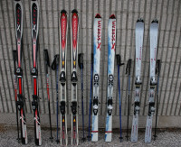 4 skis for sale Atomic Salomon Rossignol with bindings and poles