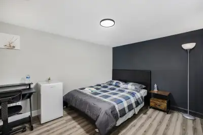 Available October 1st Spacious fully furnished room with private bathroom in a modern basement floor...