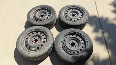 A set of 4 Michelin X-Ice tires on rims. Tire size is 205/55/16. Rim bolt pattern is 5x114.3 (5x4.5)...