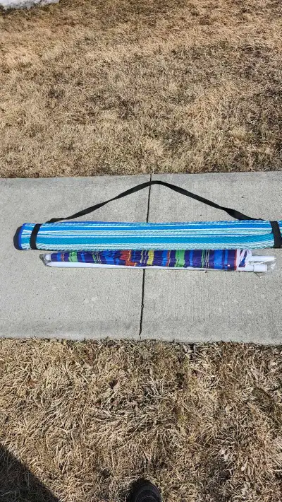 I have a beach/park mat,umbrella, and 2 black folding chairs for sale. EXCELLENT CONDITION