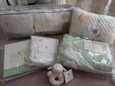 If ad is up it is available... New, unused set includes the following items: Quilt Bumper Crib Sheet...