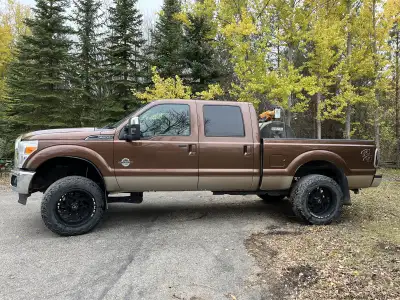 2011 Ford F250 SD Crew Cab 4WD Lariat 6.7 Diesel 4” Lift 35 x 12.50 venom tires 20 x 10 armed off-ro...