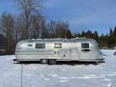 This classic Airstream has been fully refurbished, To the point of being ready for Someone to design...