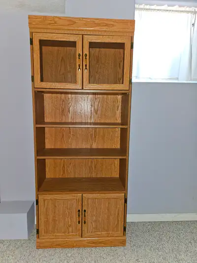 Two tall bookcases/storage shelves, View more