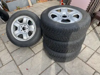 Selling a set of 4 BF Goodrich Winter T/A tires mounted on 16” steel rims. Size: 215/60R16 Condition...