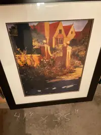 Large picture in frame of country home