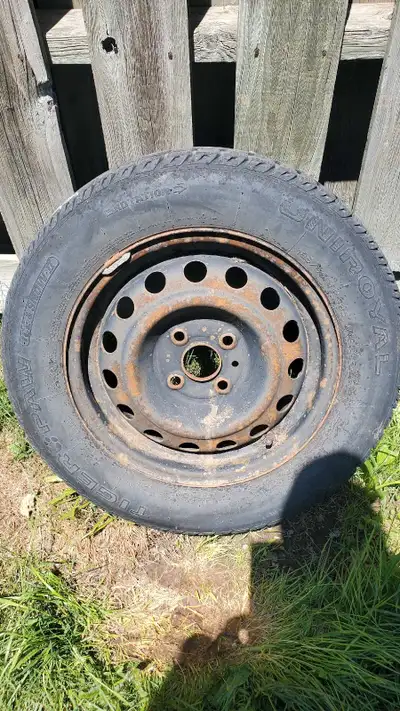 Uniroyal Tiger Paw Snow & Ice II Winter tires on rims 185/65/R14 Lots of tread left on them 4 x 100m...