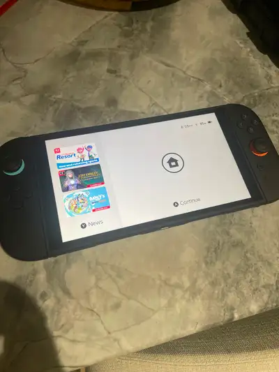 Nintendo switch 2 plus 4 games, View more