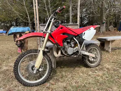 Bike is in good condition. New tires, starts first kick. Everything is straight. Has an ownership an...