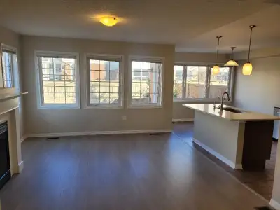 Corner unit townhouse with fenced-in yard and lots of windows and natural light. Off Canamera Parkwa...