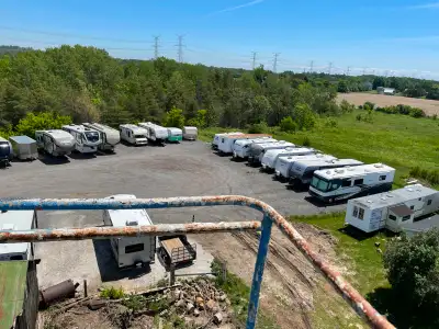 Outdoor storage available. Seacans Contstruction Equipment Trailers RV Cars Lot is secure with secur...