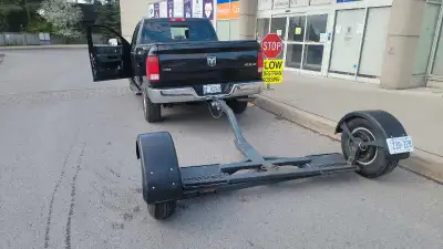I'm selling a heavy-duty car dolly that's in like-new condition, ready to make your vehicle towing t...