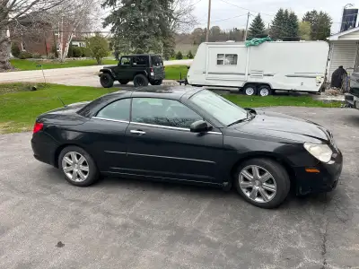 Good condition Retractable hardtop convertible 3.5L Loaded $10,000 certified Will consider trade for...