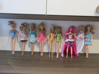 Jouet (tour magique -vaisselle- -poupées Barbie