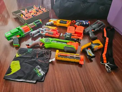 Nerf Blasters ●$25.00 for the lot or best offer ●Includes nerf darts, clips and storage box ●As pict...
