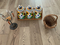 Wicker basket, candle, canisters