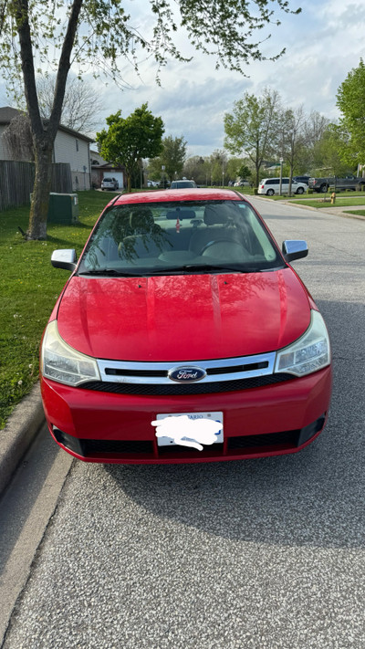 2008 Red Ford Focus