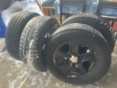 I am selling a set of four Michelin Latitude X-Ice winter tires mounted on Toyota rims, size 245/65R...