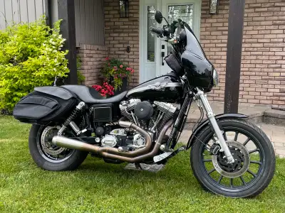 Great condition with low miles. New tires, freshly powder coated wheels, new quick detach bags, lots...