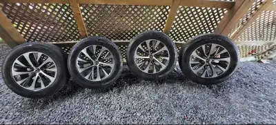 Michelin x ice snow suv 235 65 18 110t almost new with oem wheels. You can change the cap for other...