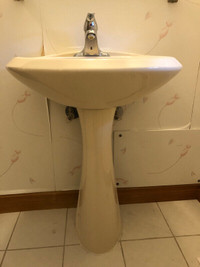 Pedestal sink with MOEN faucet
