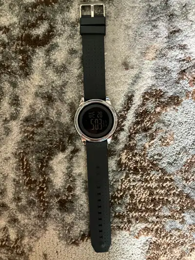 Digital watch, It is brand new, I never wore it. its great for telling the time.
