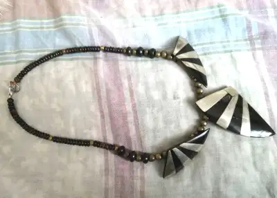 VINTAGE NATURAL BUFFALO HORN SILVER CLAD NECKLACE, View more