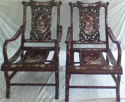 Pair of Chinese hongmu recliner chairs, View more