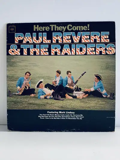 Relive the sounds of the '60s with this Paul Revere & The Raiders vinyl record, "Here They Come!" fe...