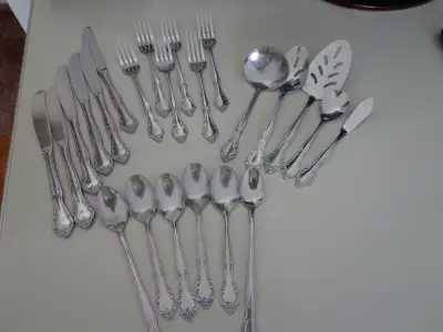 23 Pc. SET: Stainless Steel :6 Knives, 6 Forks, 6 Spoons, Note : 2 of the spoons have handles 1.5 "...